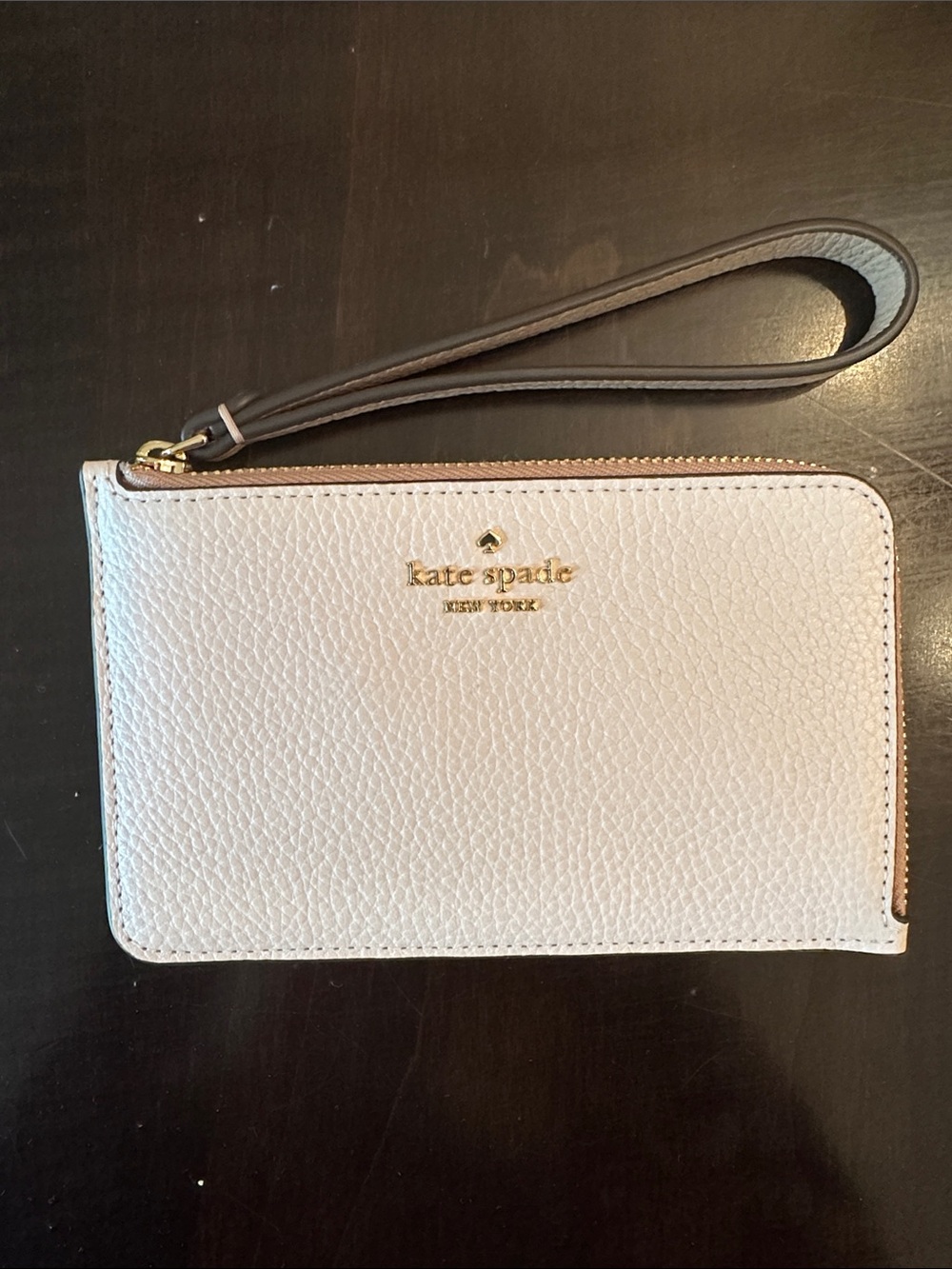 kate spade Pale Blush Pebbled Leather Wristlet with Gold Logo